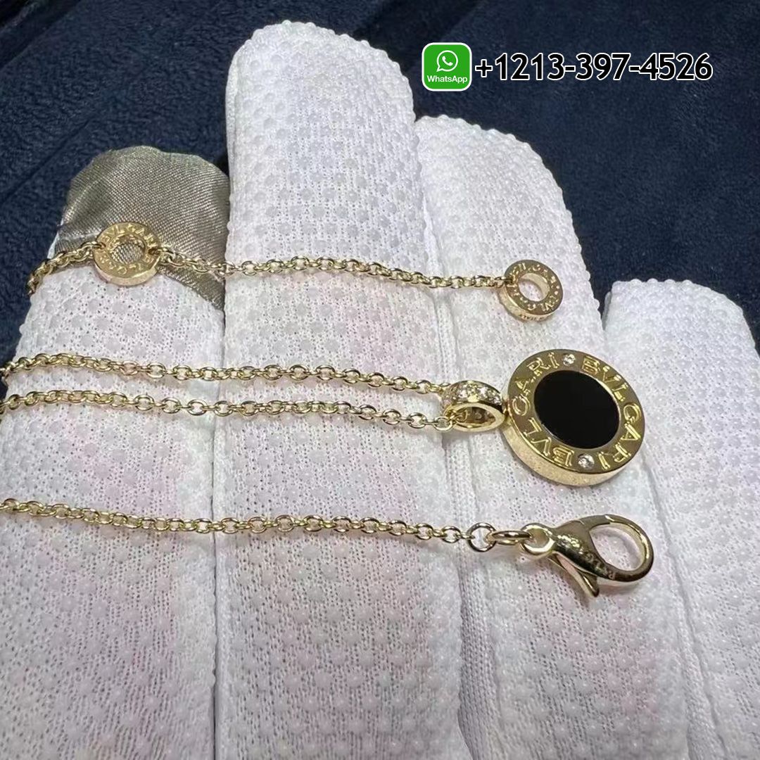 BVLGARI 18 kt rose gold chain and 18 kt yellow gold pendant set with mother-of-pearl, onyx and pavé diamonds